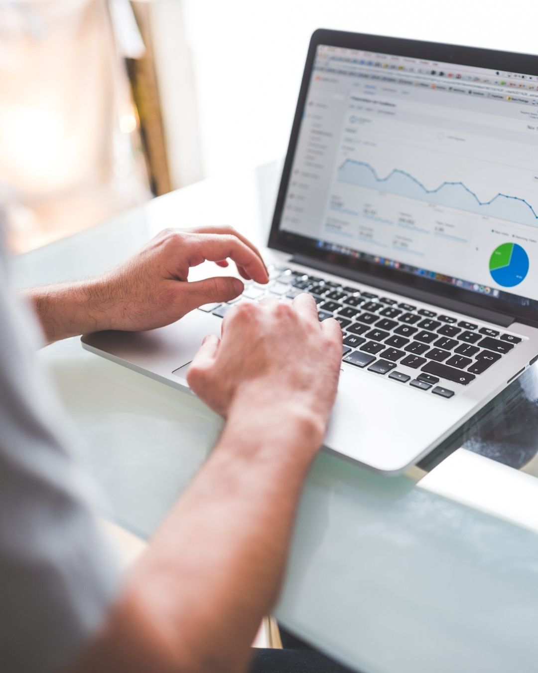 Paid Media Agency - Brick Media - Computer Showing Data and Charts